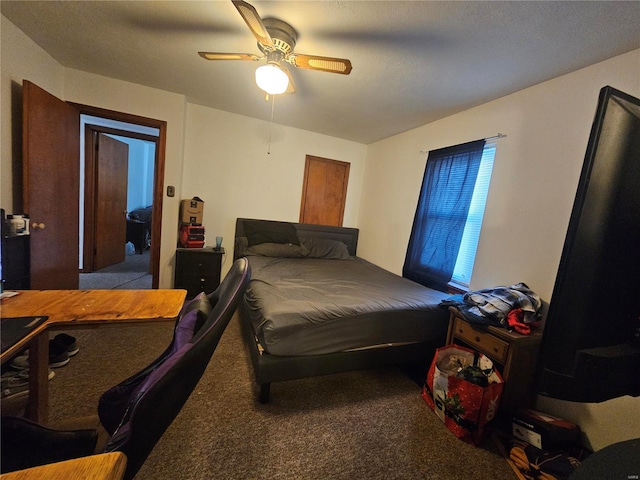 carpeted bedroom with a ceiling fan