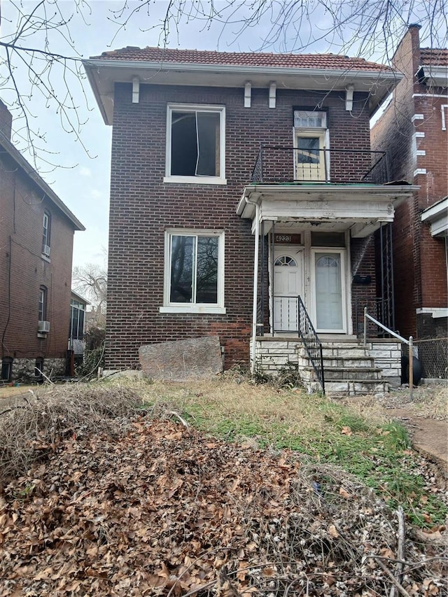 view of front of house with brick siding