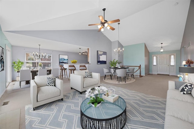 living room with baseboards, visible vents, carpet floors, high vaulted ceiling, and ceiling fan with notable chandelier