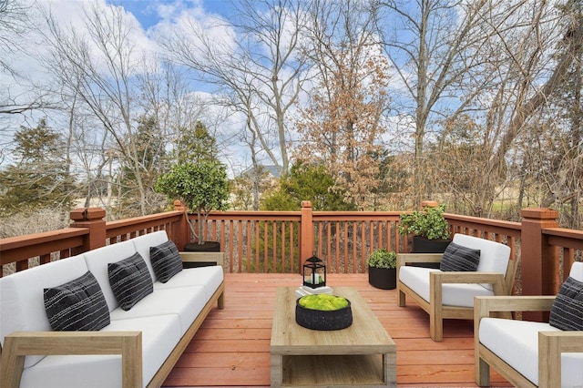 wooden deck featuring outdoor lounge area