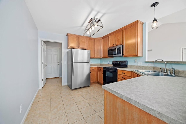 kitchen with stainless steel appliances, light countertops, hanging light fixtures, light tile patterned flooring, and a sink