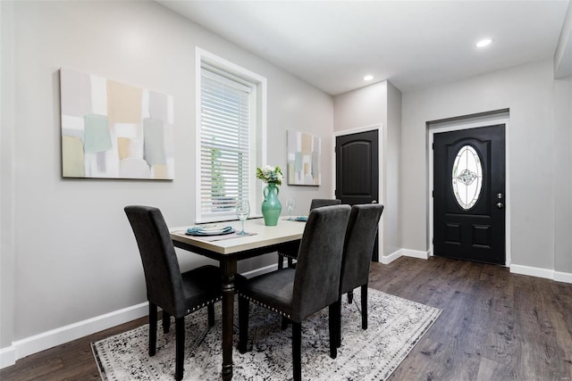 dining area featuring baseboards, dark wood-style flooring, and recessed lighting