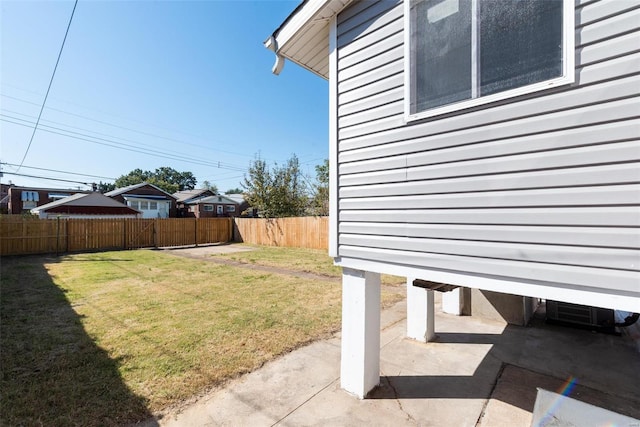 view of yard featuring a patio and a fenced backyard