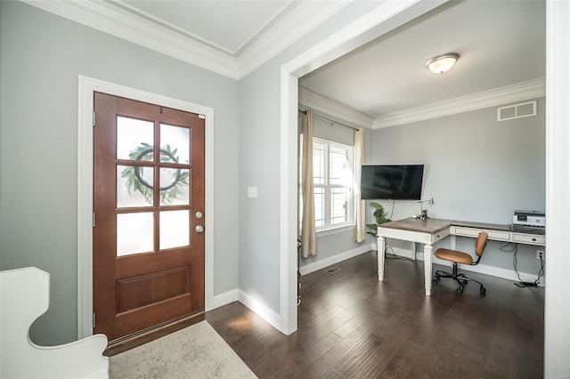 foyer with visible vents, baseboards, wood finished floors, and crown molding