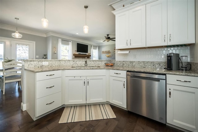 kitchen featuring ornamental molding, a sink, white cabinetry, a peninsula, and dishwasher