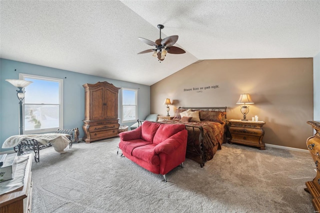 carpeted bedroom featuring a textured ceiling, baseboards, vaulted ceiling, and a ceiling fan