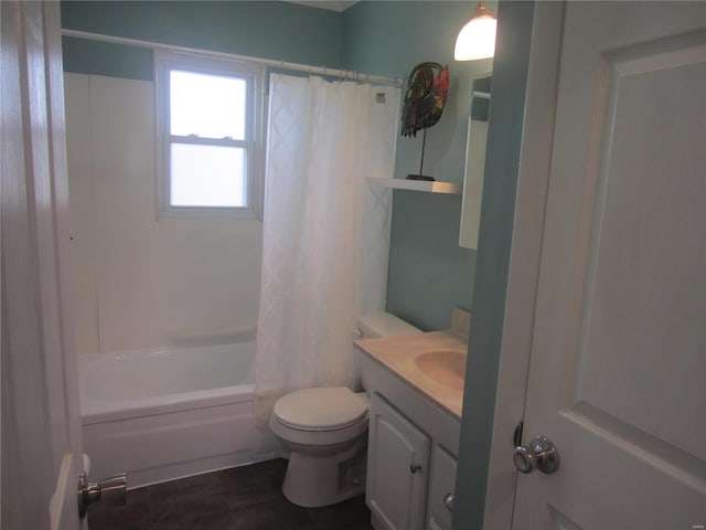 bathroom with vanity, toilet, and shower / bath combo with shower curtain