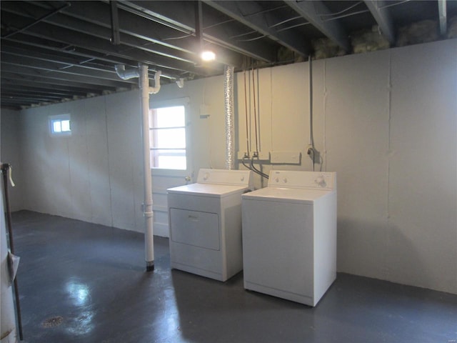 interior space with washer and clothes dryer