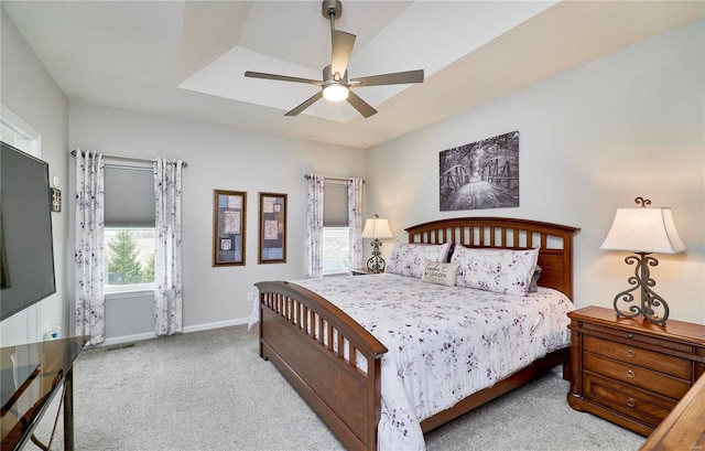 bedroom with carpet floors, baseboards, and a ceiling fan