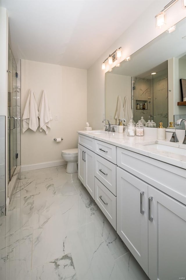 bathroom with a sink, baseboards, a stall shower, and marble finish floor
