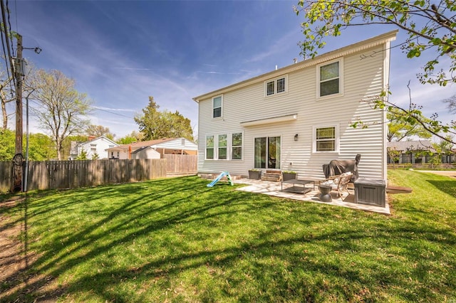 back of property featuring fence, a patio, an outdoor hangout area, and a yard