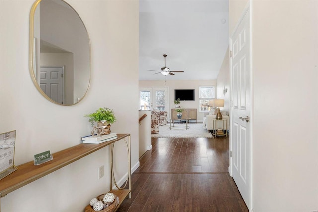 corridor featuring hardwood / wood-style floors