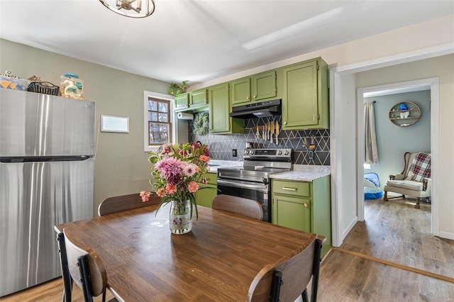 interior space featuring wood finished floors and baseboards