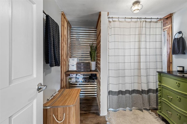 bathroom featuring wood finished floors