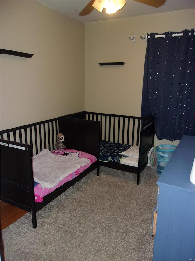 bedroom featuring a ceiling fan and carpet flooring