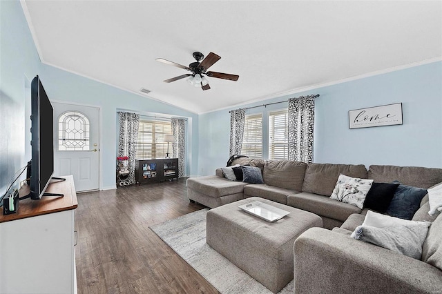 living room featuring visible vents, vaulted ceiling, dark wood-style flooring, and ornamental molding