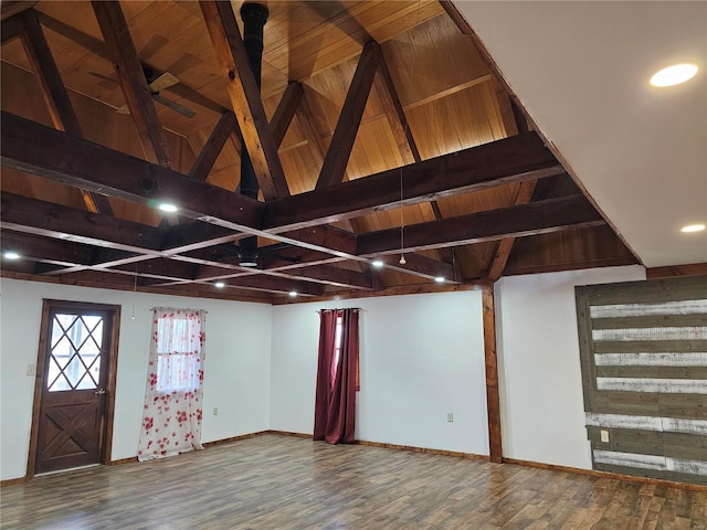 interior space with high vaulted ceiling, wood finished floors, and beam ceiling