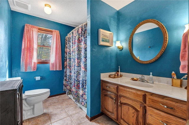 full bathroom with visible vents, toilet, vanity, baseboards, and tile patterned floors