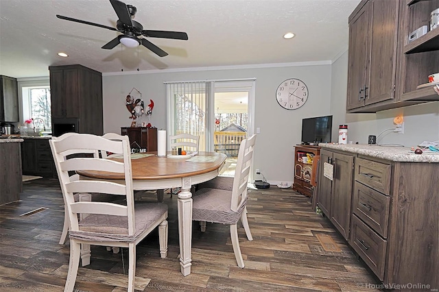 dining room featuring recessed lighting, a ceiling fan, baseboards, dark wood finished floors, and crown molding