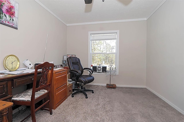 office area featuring ornamental molding, light colored carpet, baseboards, and a ceiling fan