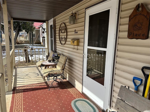 view of patio featuring a porch