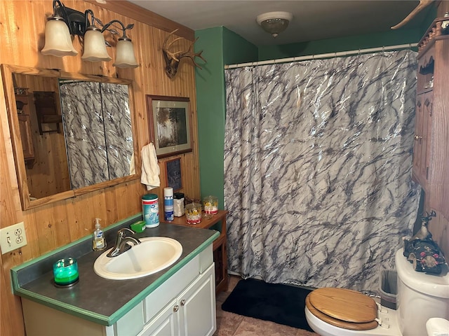 full bathroom with a shower with shower curtain, wood walls, vanity, and toilet