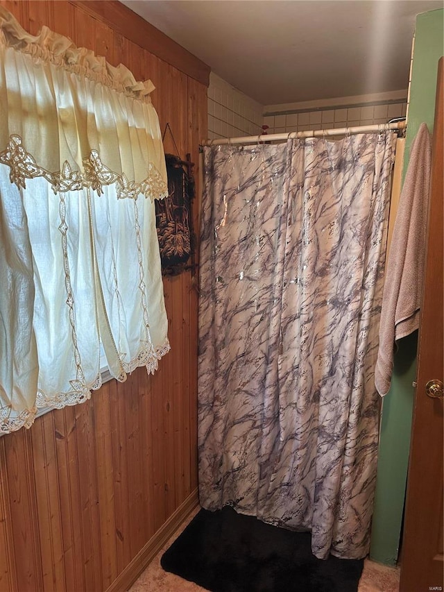 bathroom with wooden walls