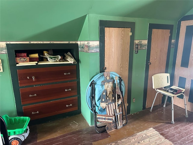 bedroom featuring wood finished floors