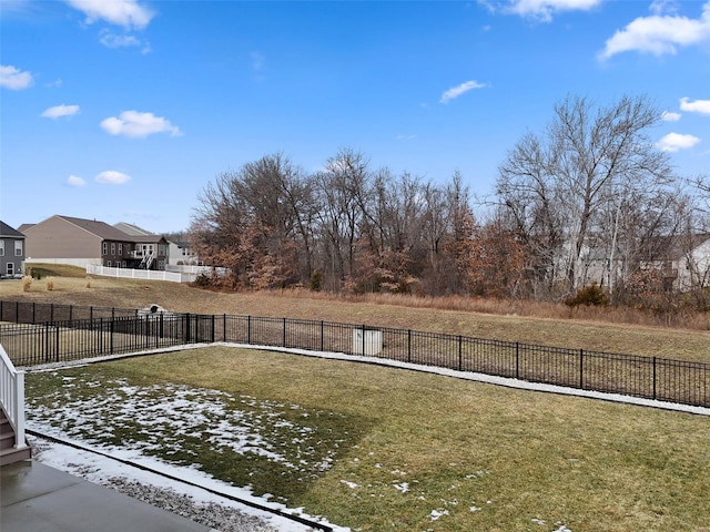 view of yard with a fenced backyard