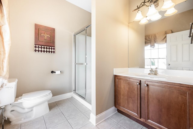 bathroom with a notable chandelier, toilet, a shower stall, and tile patterned flooring