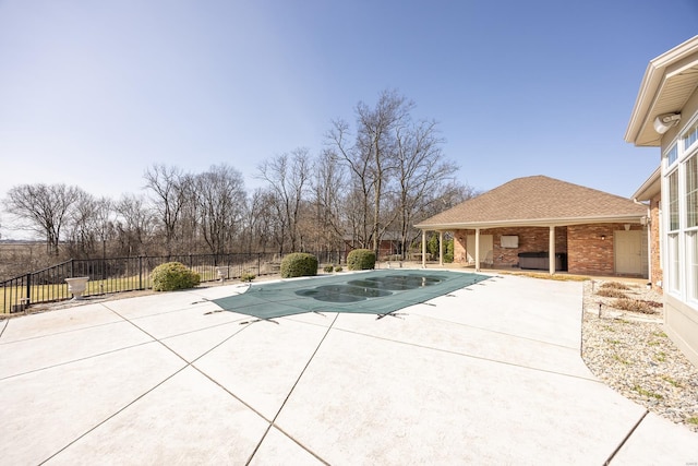 view of pool with a fenced in pool, a patio, and fence