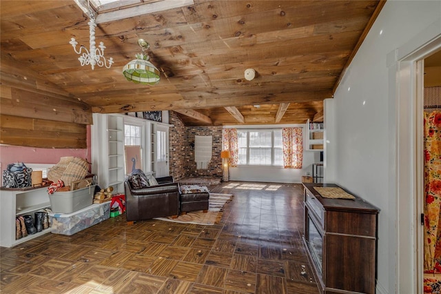 unfurnished living room with lofted ceiling and wood ceiling