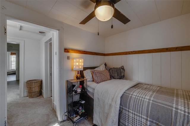 carpeted bedroom featuring a ceiling fan