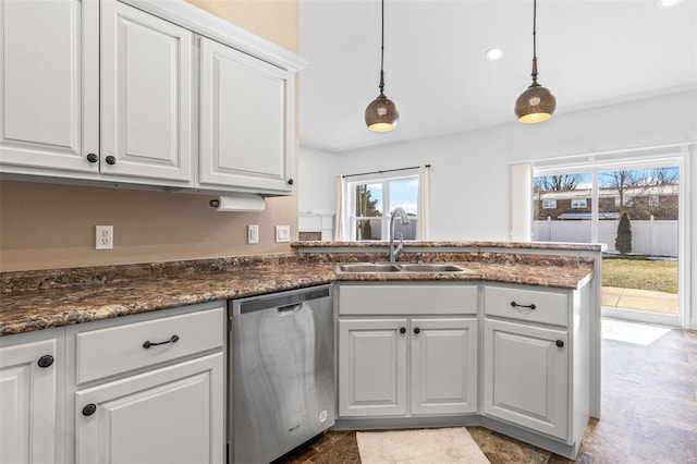 kitchen with dishwasher, a sink, white cabinetry, and pendant lighting