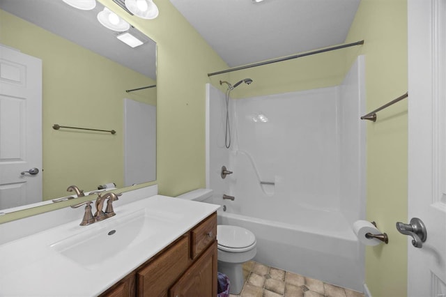 full bath with washtub / shower combination, vanity, and toilet