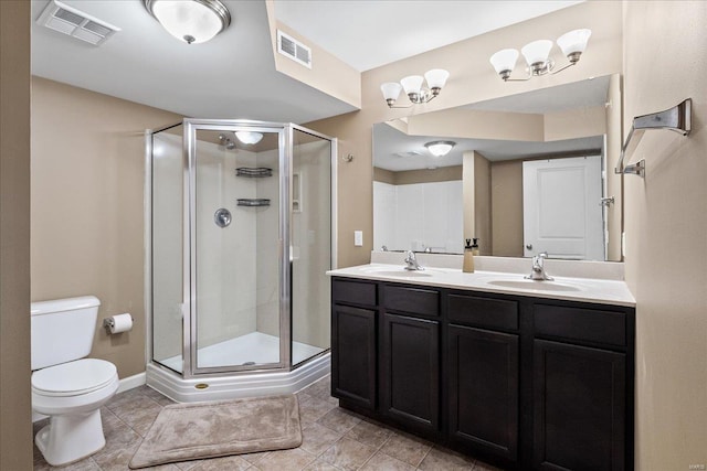 full bathroom featuring a stall shower, visible vents, and a sink