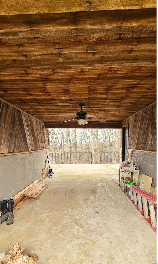 exterior space featuring ceiling fan