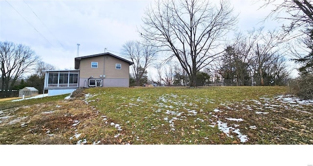 view of yard with a sunroom