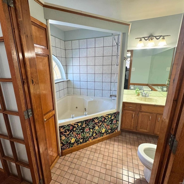 full bath featuring toilet, a tub with jets, tile patterned flooring, and vanity