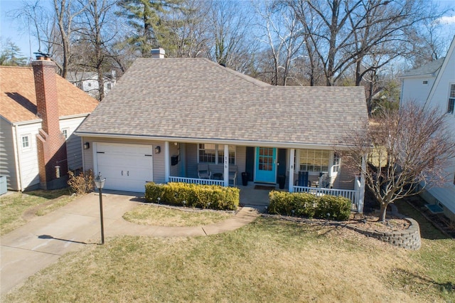 ranch-style house featuring a porch, an attached garage, concrete driveway, roof with shingles, and a front lawn