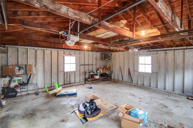 garage featuring a garage door opener