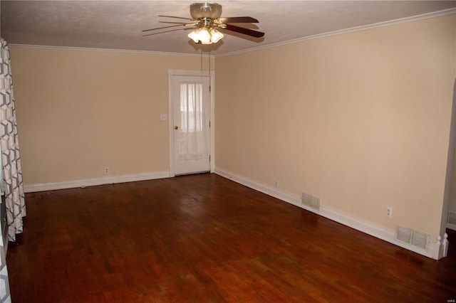 empty room featuring baseboards, visible vents, ceiling fan, ornamental molding, and dark wood-type flooring