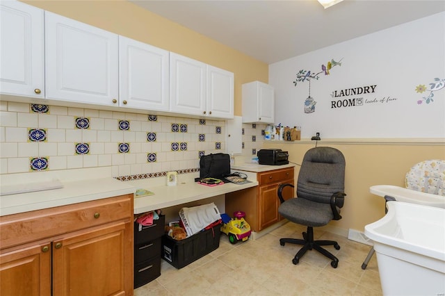 home office featuring light tile patterned floors and visible vents