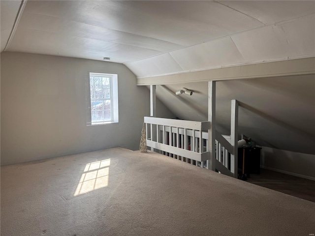 bonus room featuring lofted ceiling