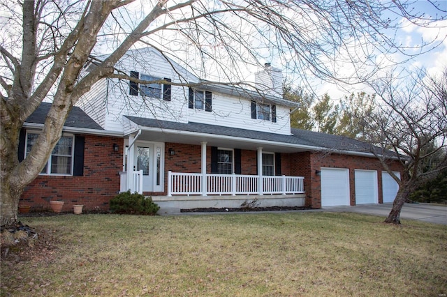 view of front of property with a chimney, an attached garage, covered porch, a front lawn, and brick siding