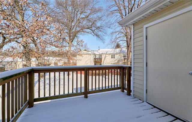 view of snow covered deck