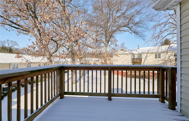 view of snow covered deck