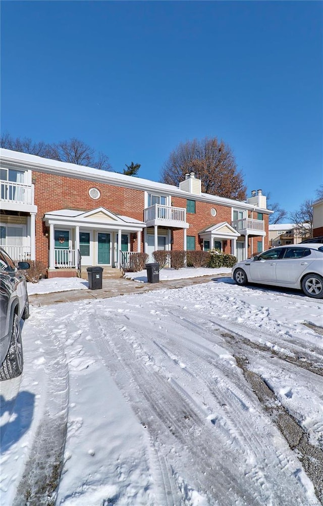 view of snow covered building