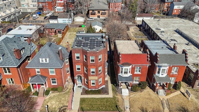 birds eye view of property with a residential view