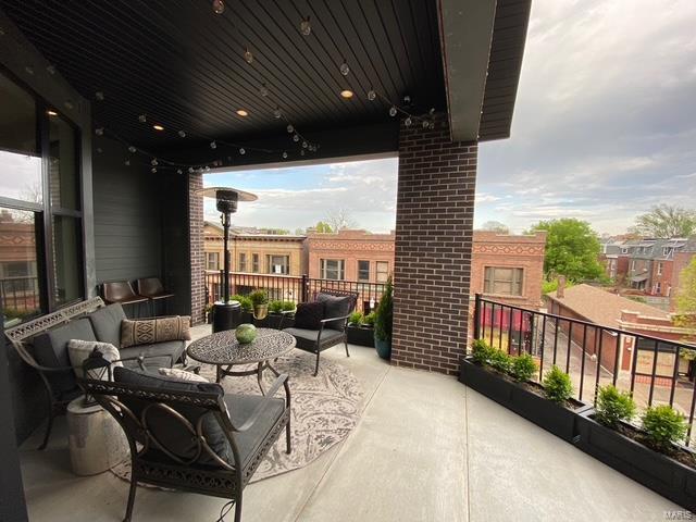 view of patio / terrace featuring outdoor lounge area and a balcony